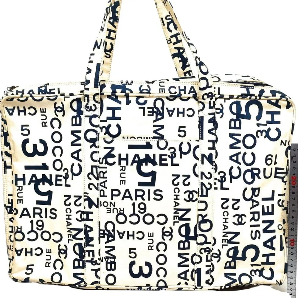 Authentic CHANEL Rue Cambon Travel Bag Vintage White & Navy Canvas - Picture 2 of 11